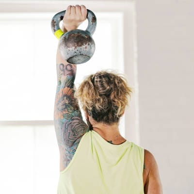 Man working out with kettlebell