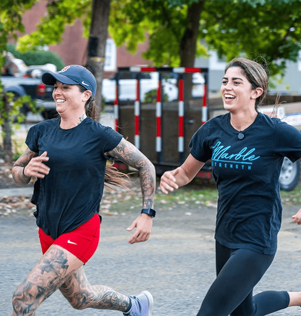 Women running at Marble Strength