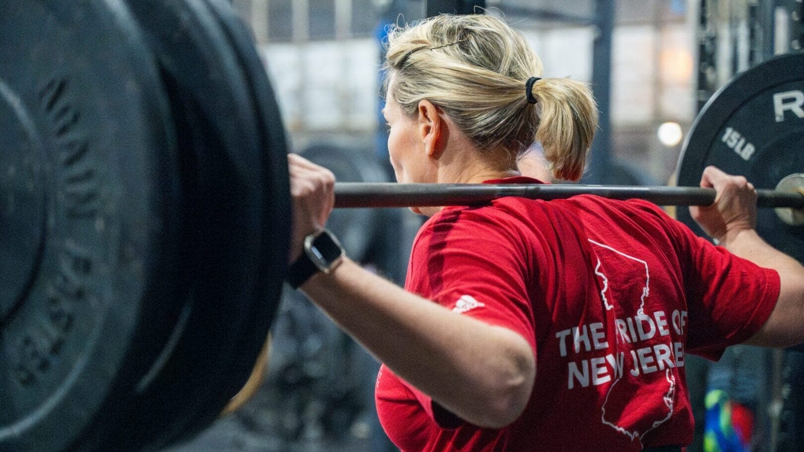 woman strength training at Marble Strength Freehold NJ with personal coach