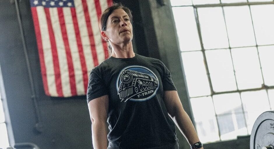 female client celebrating workout success at Marble Strength Freehold NJ gym